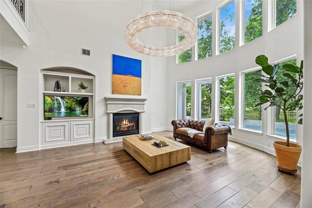 Several windows in the family room display an amazing view of the spectacular oasis backyard!