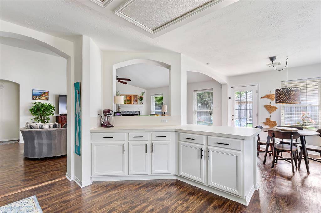 Kitchen open to the living room and breakfast area