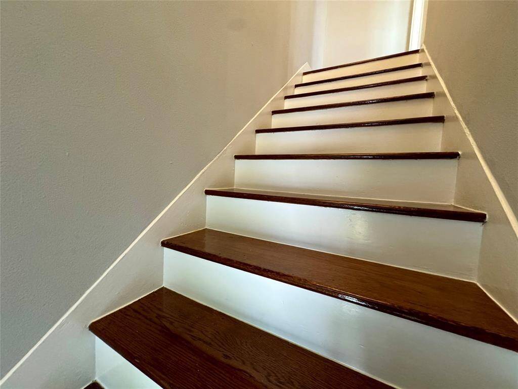 Stairs leading to unit (front door view)