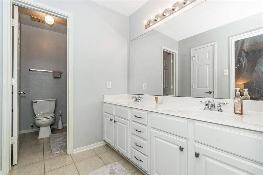 Bright game room for additional guest seating, or add a pool table for entertainment.