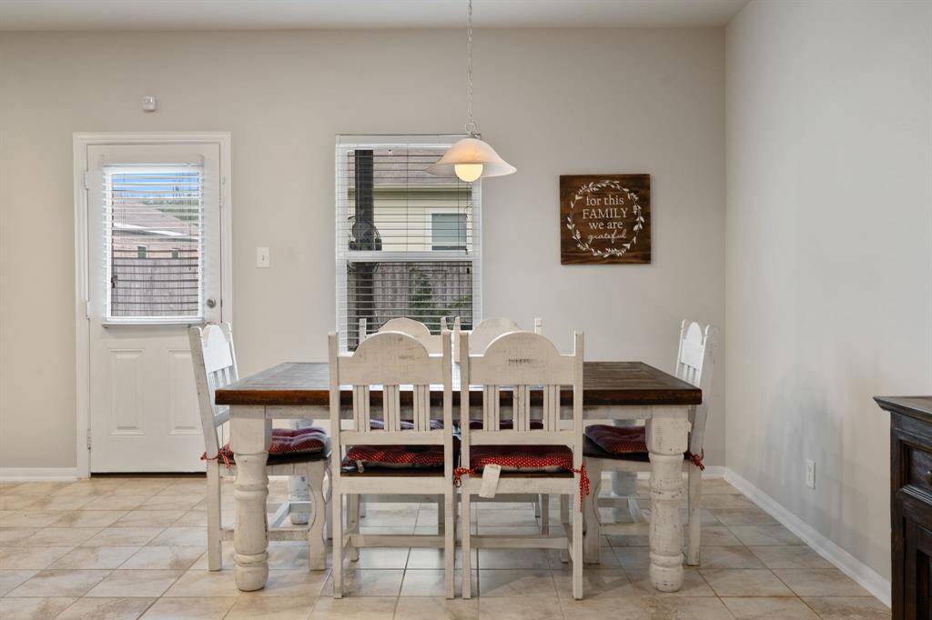 Bright and open kitchen with island seating and dining space