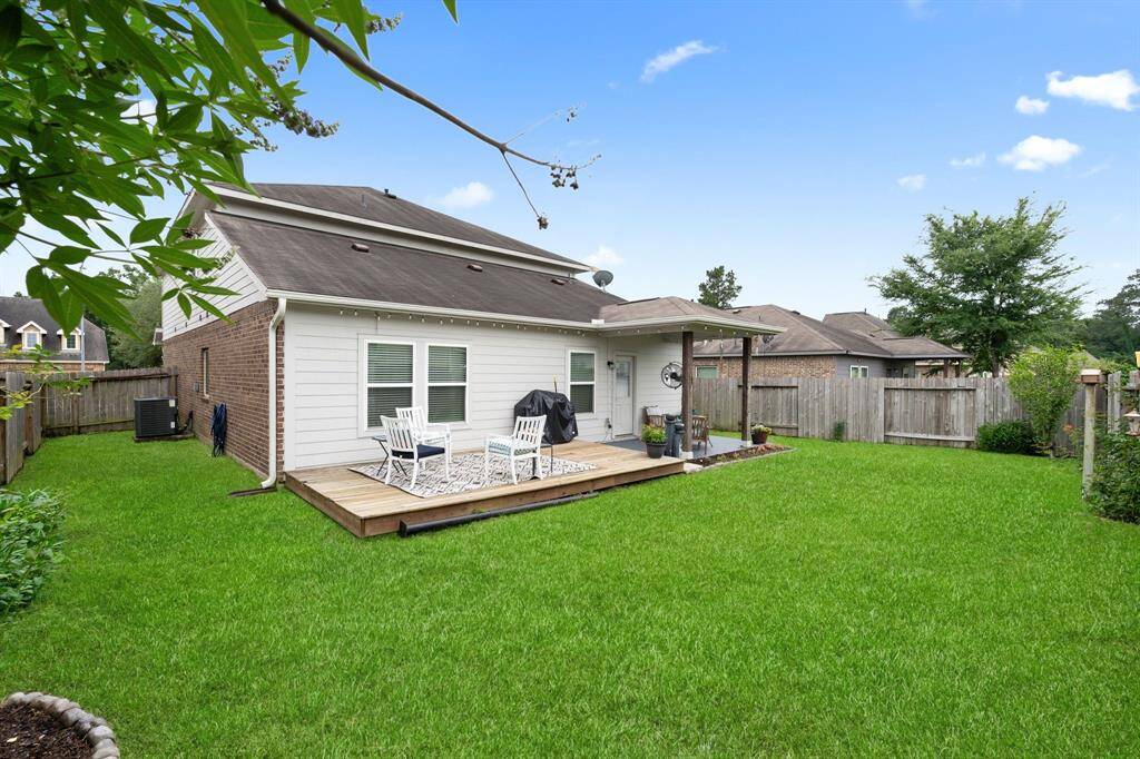 Enjoy outdoor gatherings on your deck and covered patio