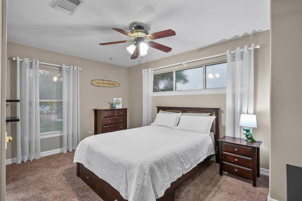 Secondary upstairs bedroom with private ensuite bathroom