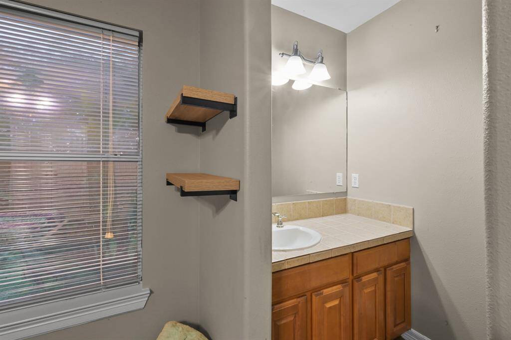 Private sink serving the secondary bedroom