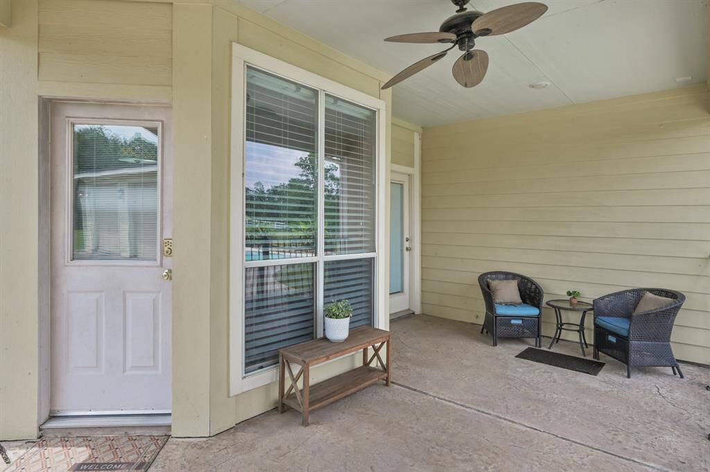 Covered back patio extends from the house to the detached garage perfect for morning coffee!