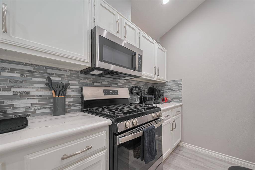 Stainless steel microwave & gas range.