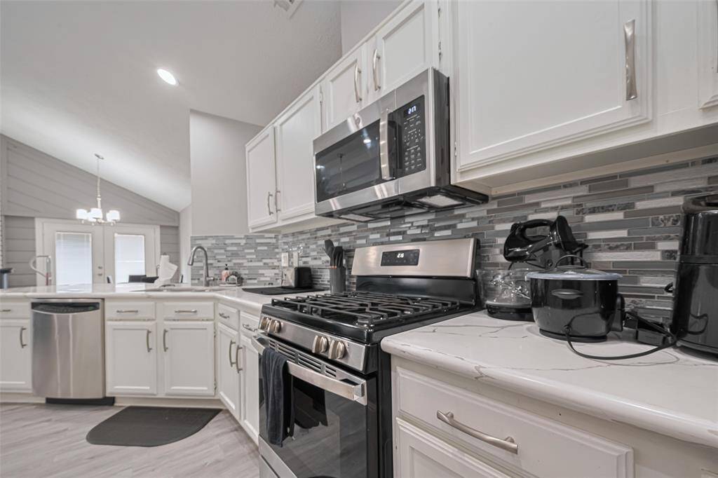 Lots of counter workspace, actually.  Note all the appliances that they keep on the counter.