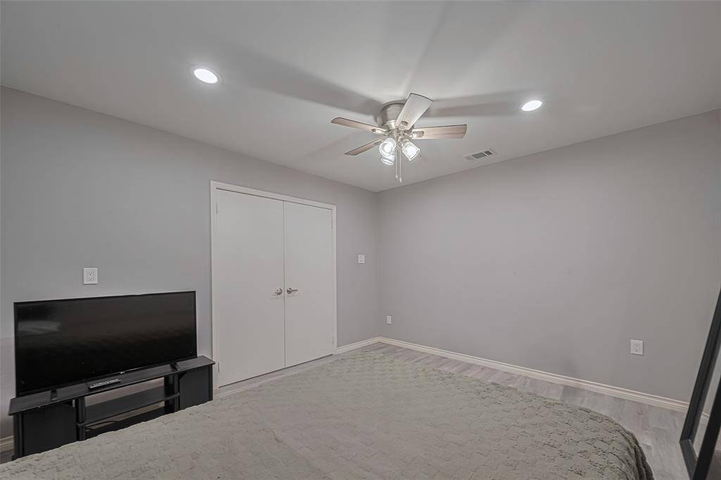 Flex room currently used as a bedroom.  This is a large room. It does NOT have a closet so it isn't technically a bedroom, but it could also be used as one, as well as a study, exercise room or a game room.