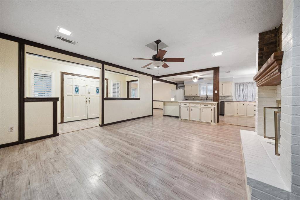 Front doors have stained glass accents.