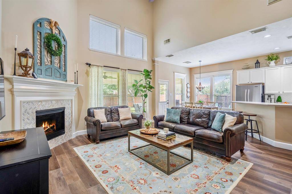 Tucked away in the corner of the home and overlooking the back porch, the family room offers a relaxing and tranquil space to unwind.