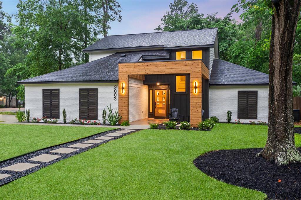 EVERYTHING IS NEW! Do not miss this fabulous modern home in its glory. Reimagined front facade has new painted brick, hardiplank siding, new windows, roof, concrete driveway - it's the complete new home package! Stained natural wood structure adds a striking presence, along with new modern shutters adding architectural appeal. Welcoming feel with outdoor lighting, new landscaping with added walkway lends to the exciting curb appeal.