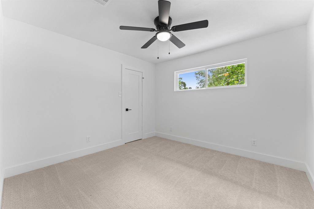 Bedroom 3 Brand New Everything! Plush carpeting. New windows. New trim/doors. New ceiling fan.