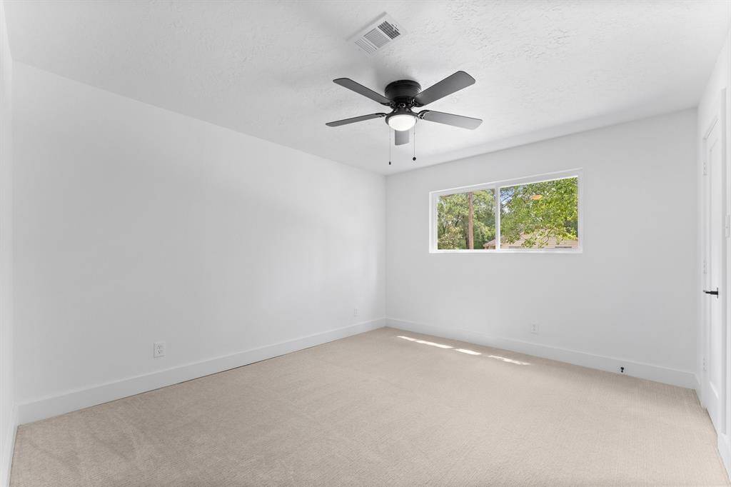 Bedroom 4 all brand new! Plush carpeting, new paint, new window, new trim/doors and new ceiling fan.