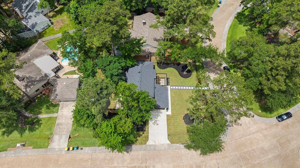 Overhead view of home and surrounding homes.