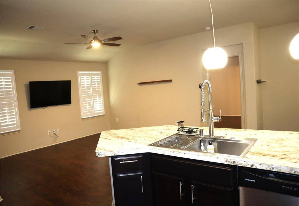View from kitchen into living room.