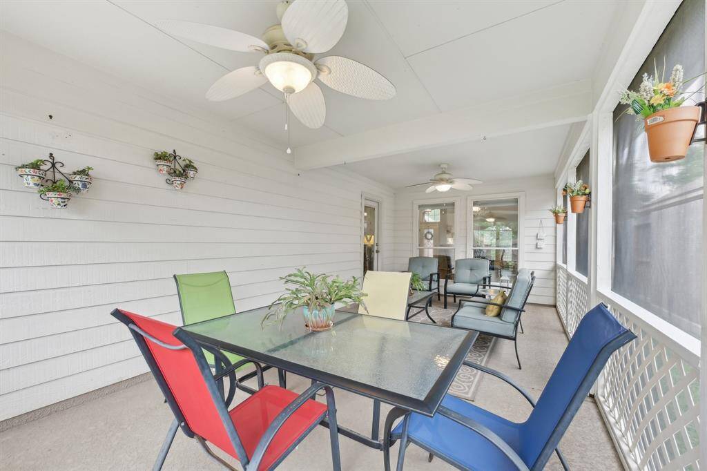 Amazing screened in porch that is perfect for relaxing or entertaining.