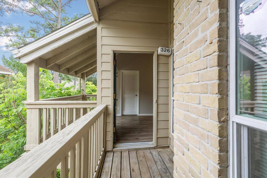Private Stairwell leads to the Porch and Front Door