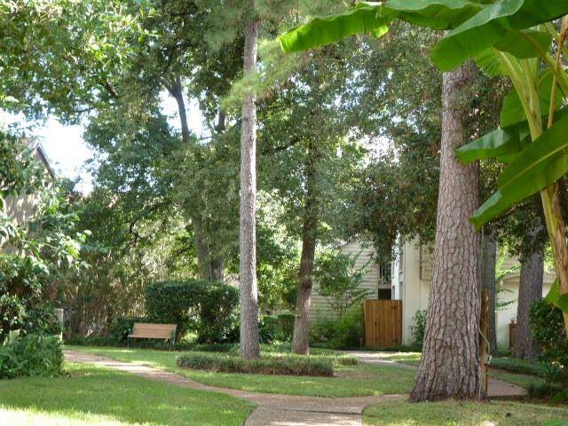 Lush Landscaping throughout the property.  Enjoy Walks Along the Winding Sidewalks.  The Property is Fully Fenced.
