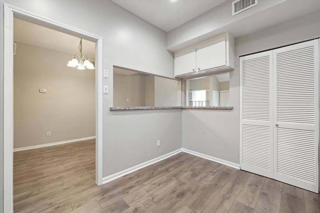 Kitchen Views into the Dining and Living Areas