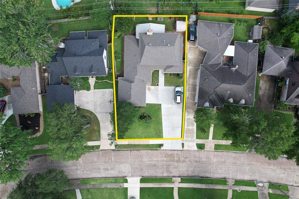 LOT LAYOUT WITH EXTRA WIDE DOUBLE VEHICLE DRIVEWAY AND EXTENDED PARKING!