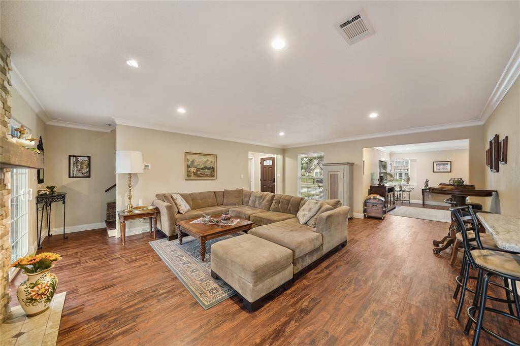 Wide view showing extended living space perfect for entertaining and family gatherings.