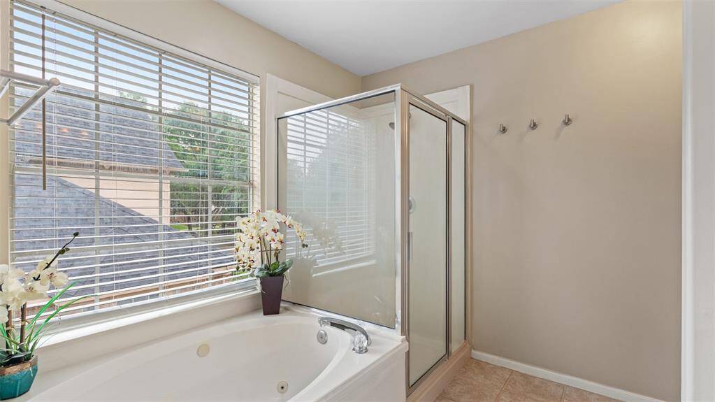 Primary bath with separate tub and shower