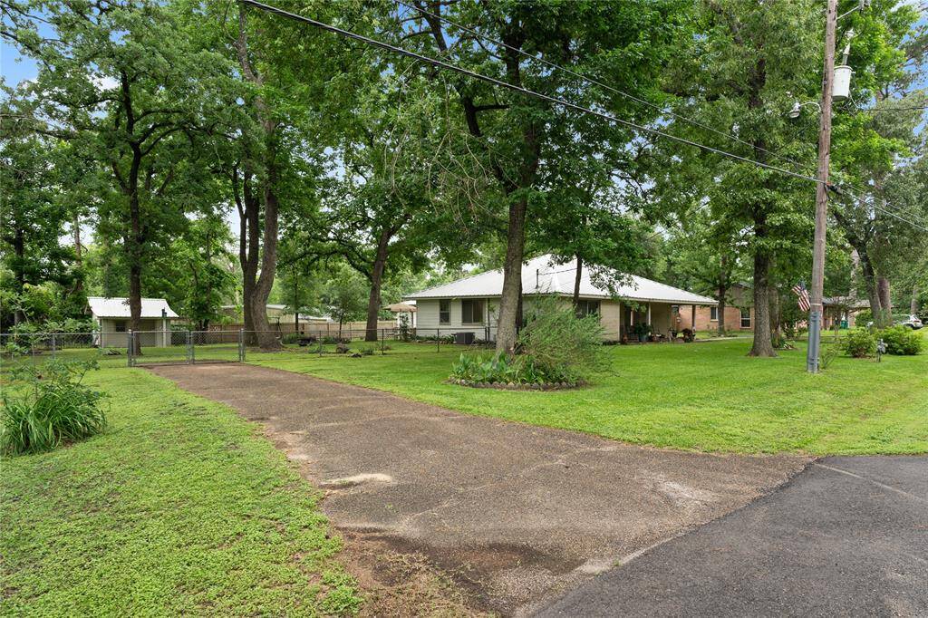 Here you can see the extra driveway that is fit for parking an RV or Boat if needed!