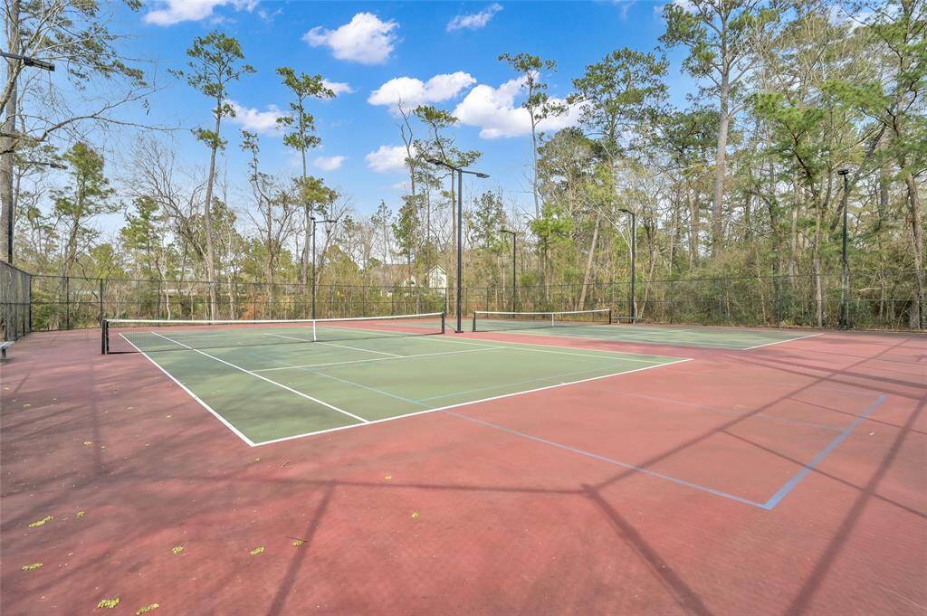 Spacious outdoor tennis court.