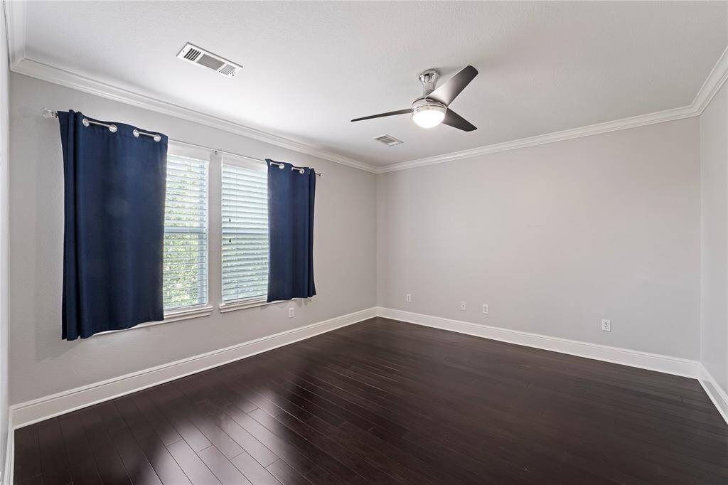 Large secondary bedroom located on the 3rd floor. This bedroom also features an ensuite bath