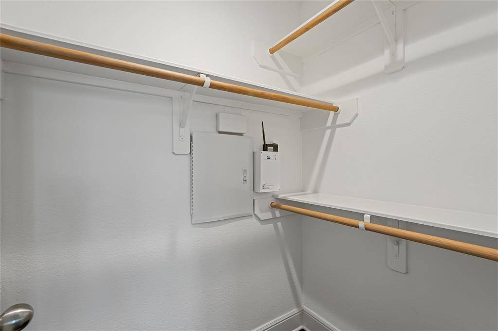 Large closet with plenty of space for the secondary bedroom upstairs.