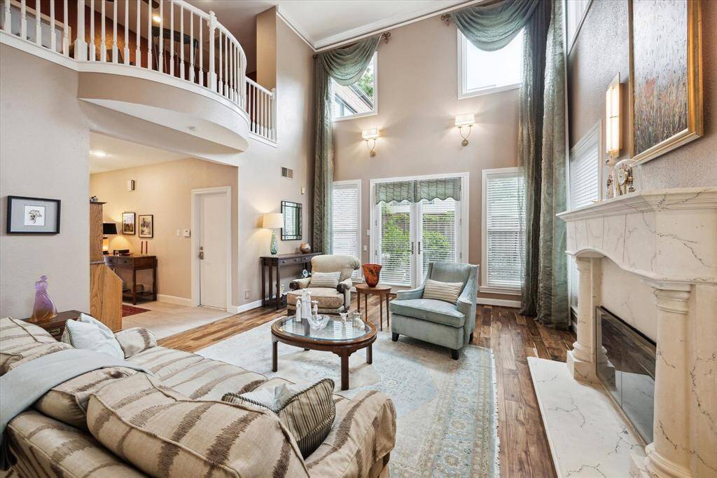 Another view of the spacious living room. French doors to second patio.