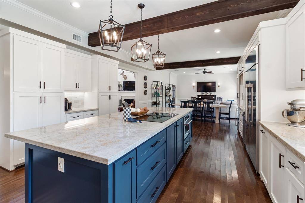 This thoughtfully designed kitchen blends spaciousness, storage and sophisticated luxury.