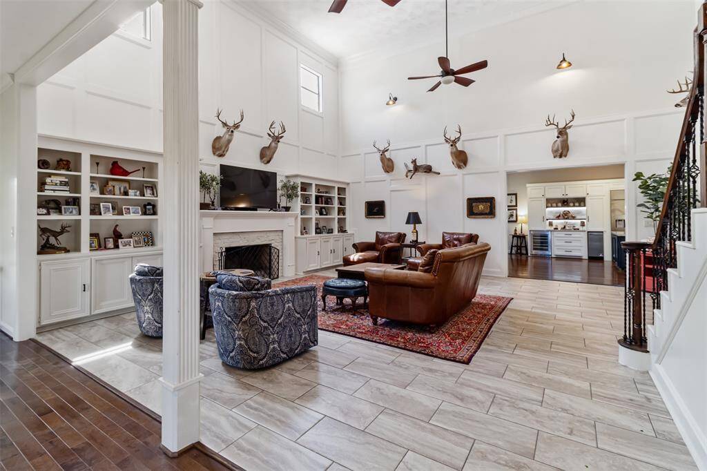 A blend of color, natural light, architecture, and modern fixtures gives this room a distinctive, elevated feel.