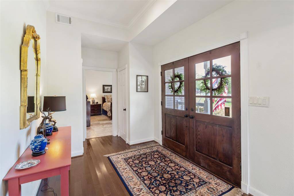 To the right of your front doors is an additional bedroom with an en-suite bathroom, perfect for a guest retreat.
