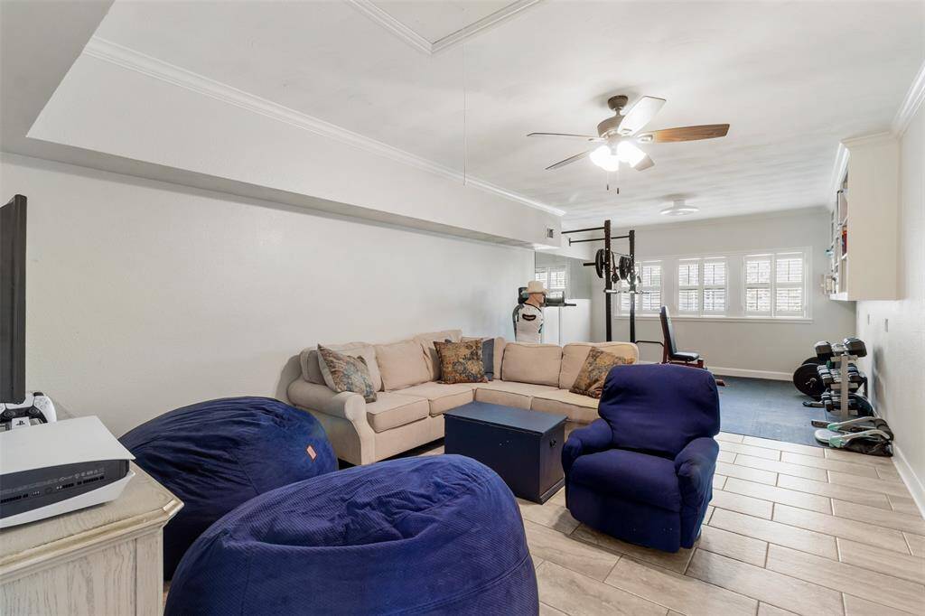 The game room doubles as a tv space, movie room or workout room. The possibilities are endless.