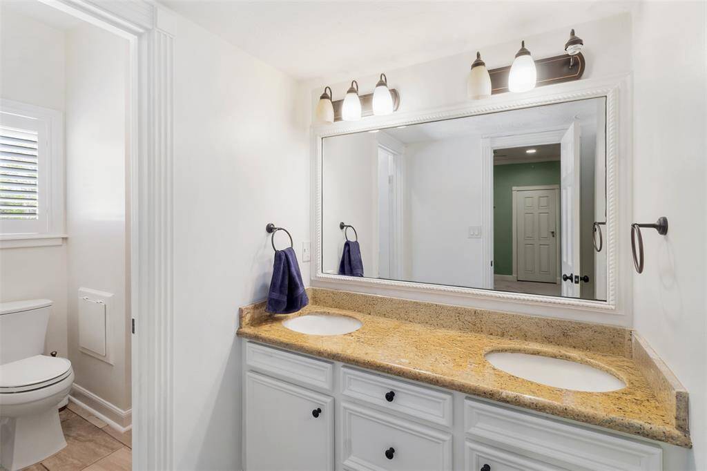 Both bedrooms have their own vanity space with a jack-and-Jill bathroom.