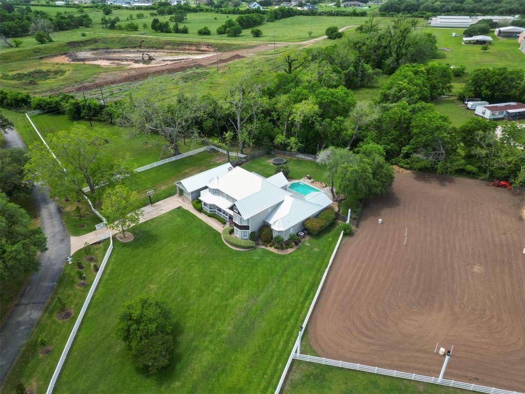 Ariel view of the land and horse arena next door.