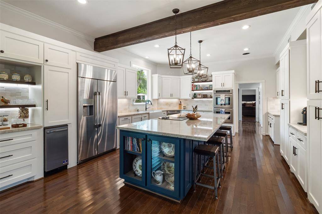 Your coffee has a place as well as your wine in this kitchen.