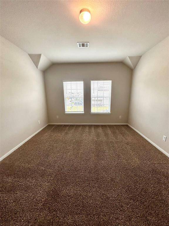 Primary Room with accent corners and natural lighting.