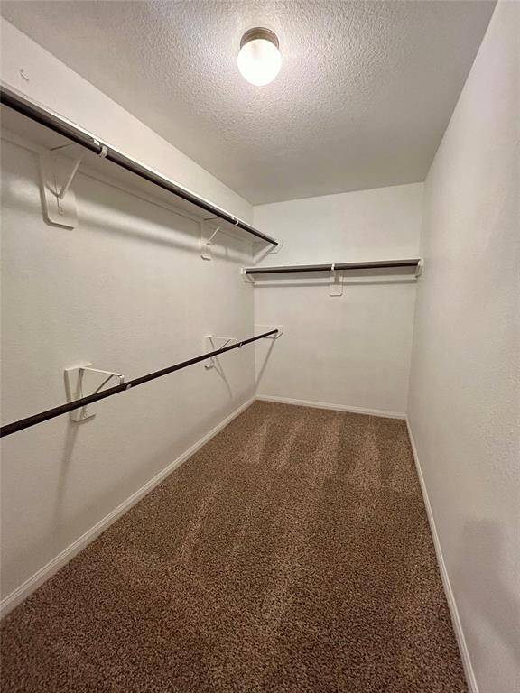 Large walk-in closet! Tons of room in here.