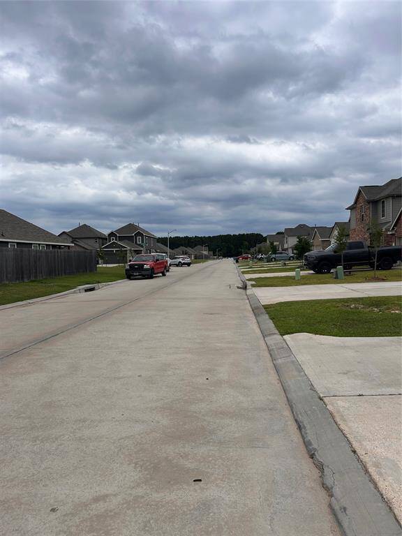 Concrete roads, nice cars, neighborhood amenities. What else could you ask for? Close location to schools, work, groceries?? CHECK!!