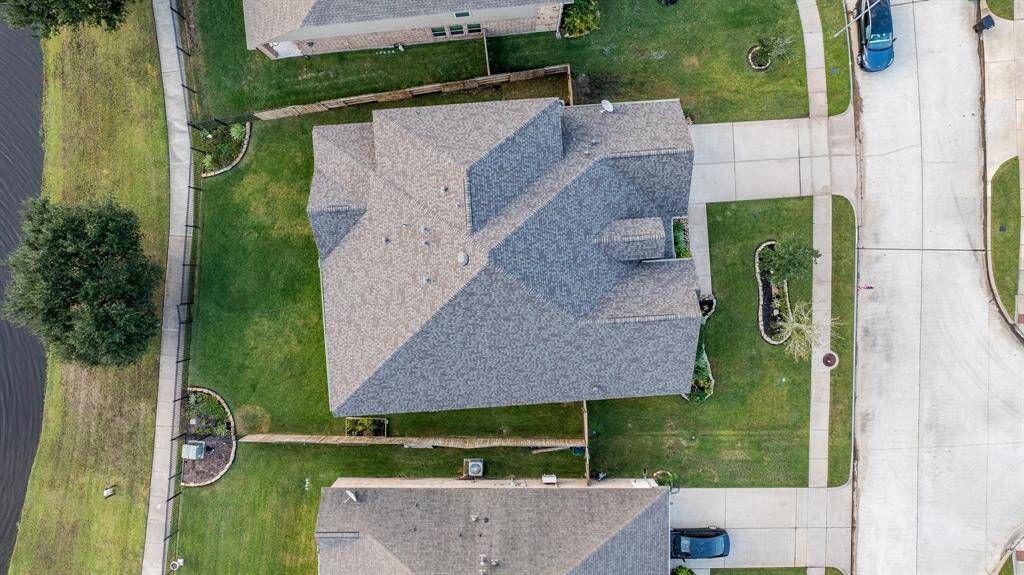 New 30 year shingle roof less than a year old!