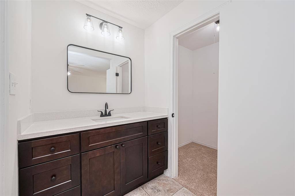 Primary Bath -Newly remodeled , new counters , cabinets , lighting and mirror