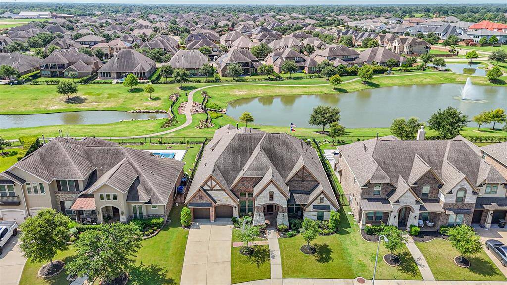 Welcome to 23615 Dolci Lane! A beautiful water view property located on a quiet cul-de-sac in Lakes of Bella Terra!
