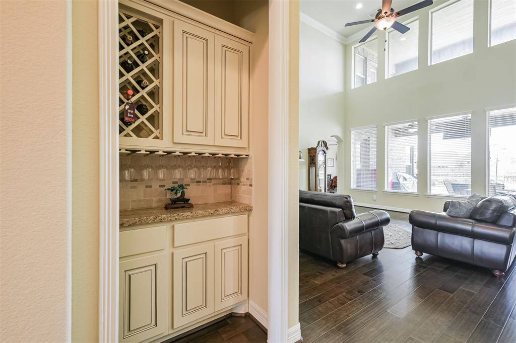 There is also a Wine Bar for storing your favorite beverages with easy access to the Formal Dining, Living or Kitchen areas.