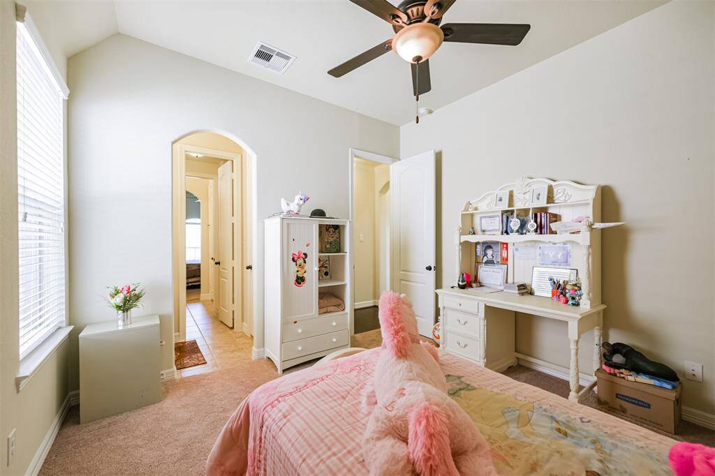 Another view of the third Bedroom and a glance into the Hollywood Bath.