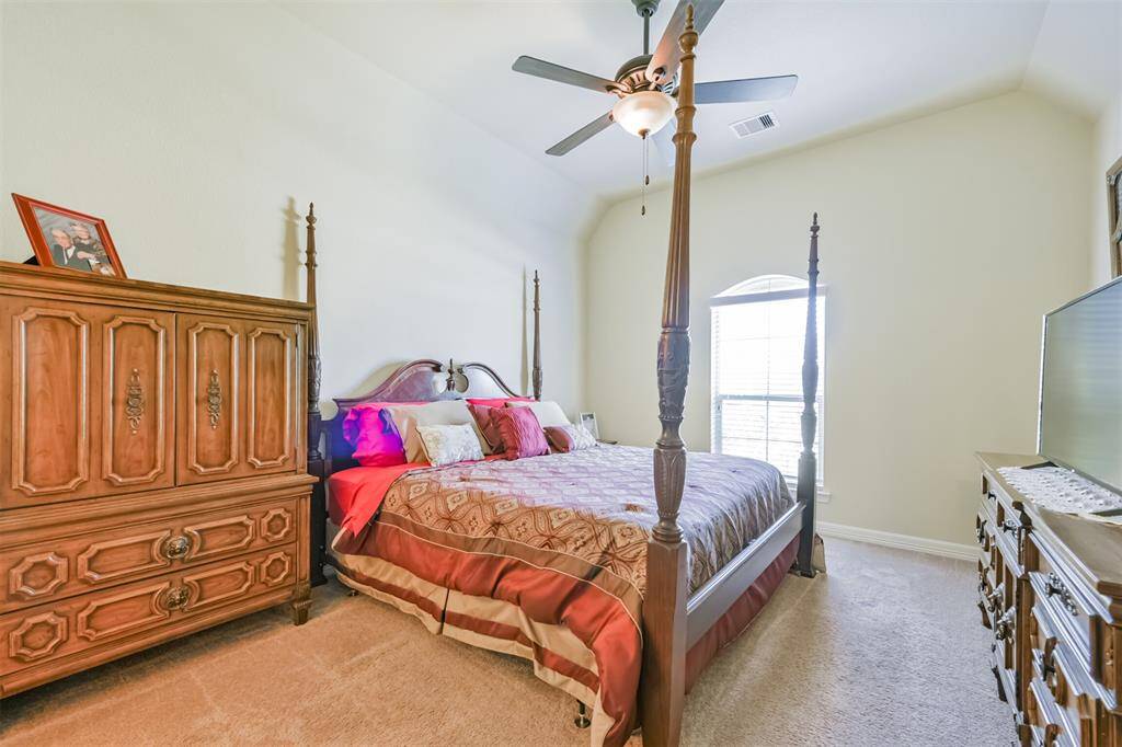 Fourth bedroom at the front of the home is also spacious and bright.