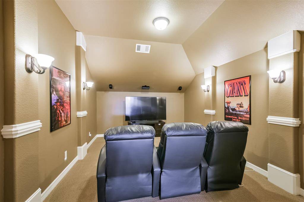 Enjoy your favorite movie in this stylish Media Room.  Speakers for exceptional sound and carpet for sound proofing.