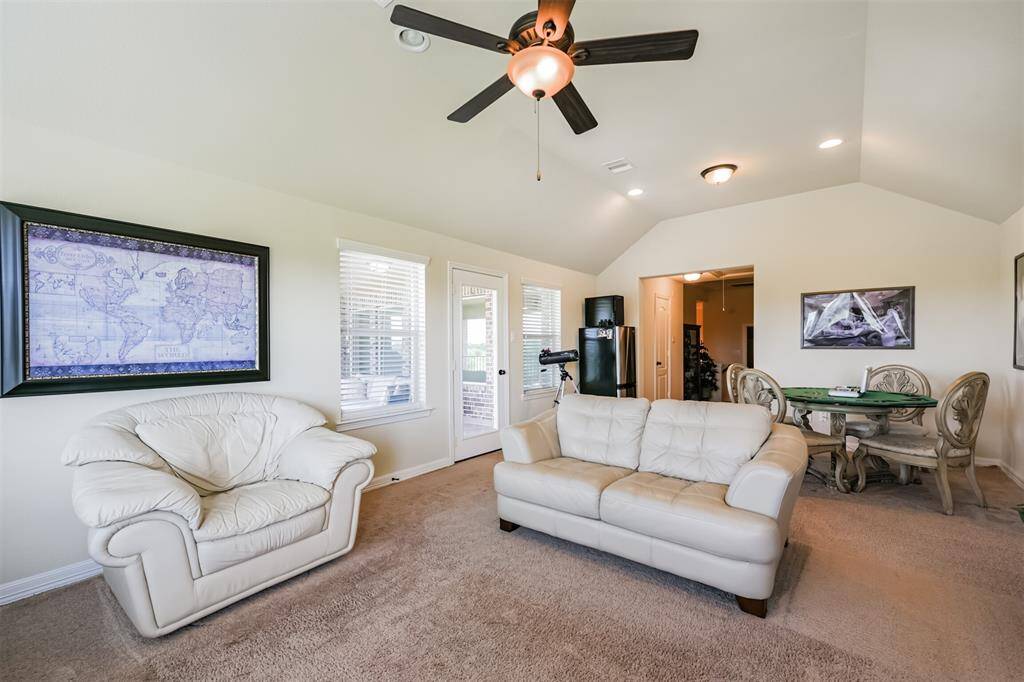 The upstairs Game Room offers room for a card table, sitting area, and telescope for star gazing.