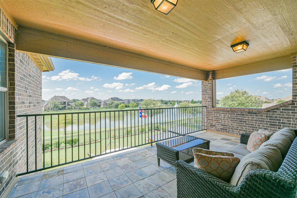 This covered Porch is located off the Game Room and provide a beautiful view of the lake.